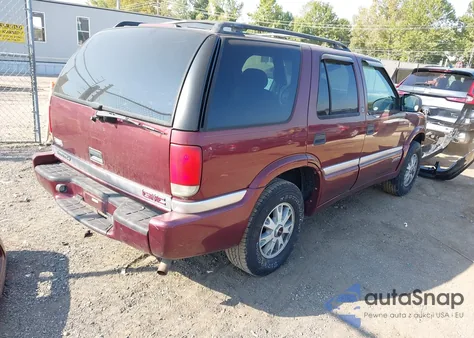 2000 GMC Jimmy Sle z USA, uszkodzony, nr VIN 1GKDT13W7Y2364600